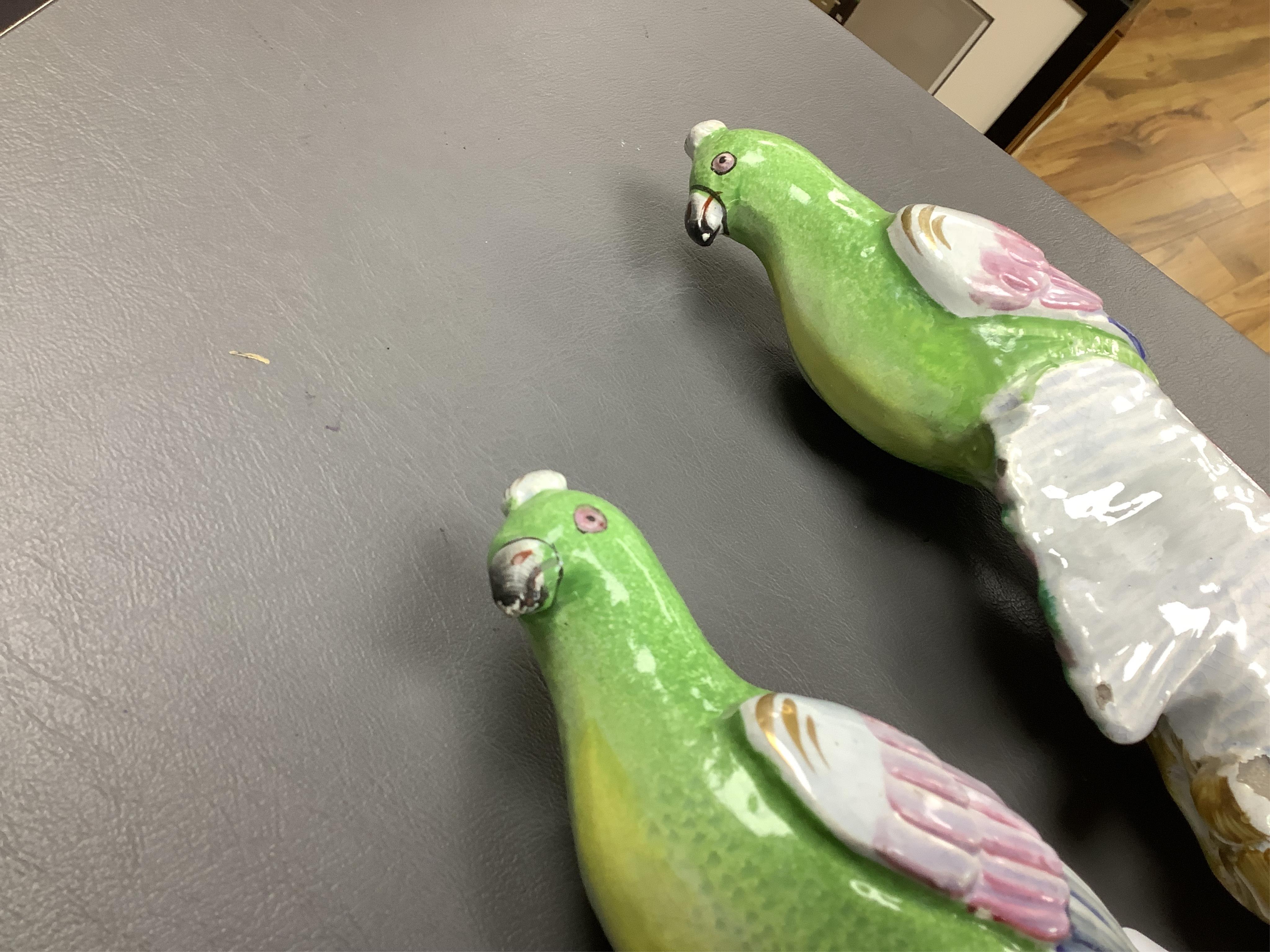 A pair of early 19th century pearlware parrots, ex John Howard, 24cm high